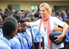 Actor Charlize Theron with children in South Africa