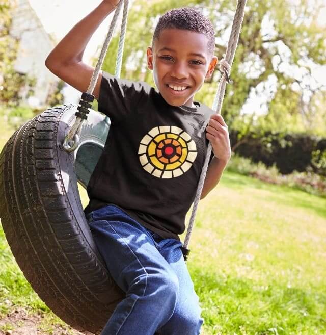 Adolescent wearing a CTAOP logo shirt