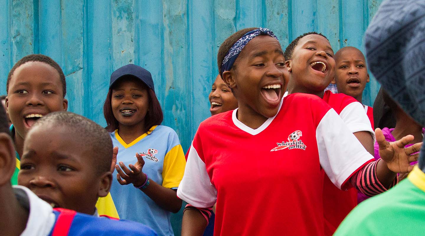 Group of kids smiling and laughing