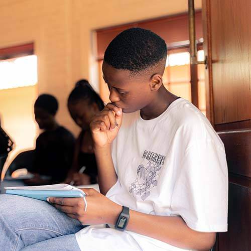 Young man studying intently