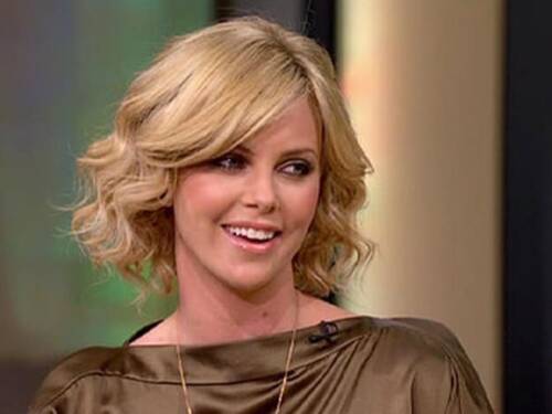 actress Charlize Theron smiling
